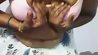 Chubby dark skinned webcam masked Desi whore plays with boobies