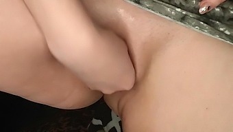 Fisting a shaved pussy upskirt