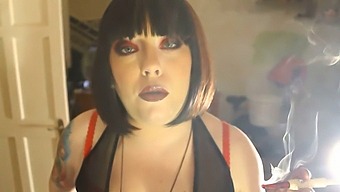 Fat Submissive Smokes A Cigarette In A Holder